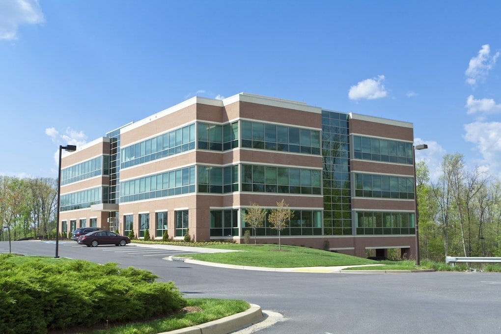 picture of large commercial office building: building an office