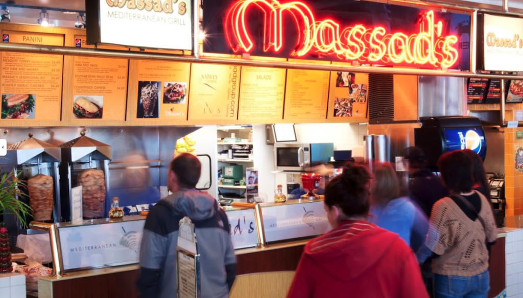 people waiting in line at massad's mediterranean grill; best restaurants in mankato