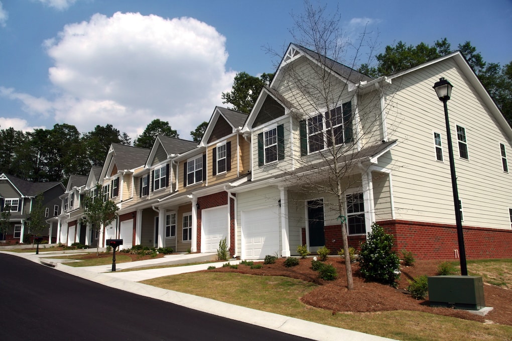 A row of new multi-family homes or condominiums.