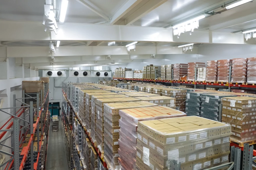 produce boxes placed on top of each other at the cold storage warehouse