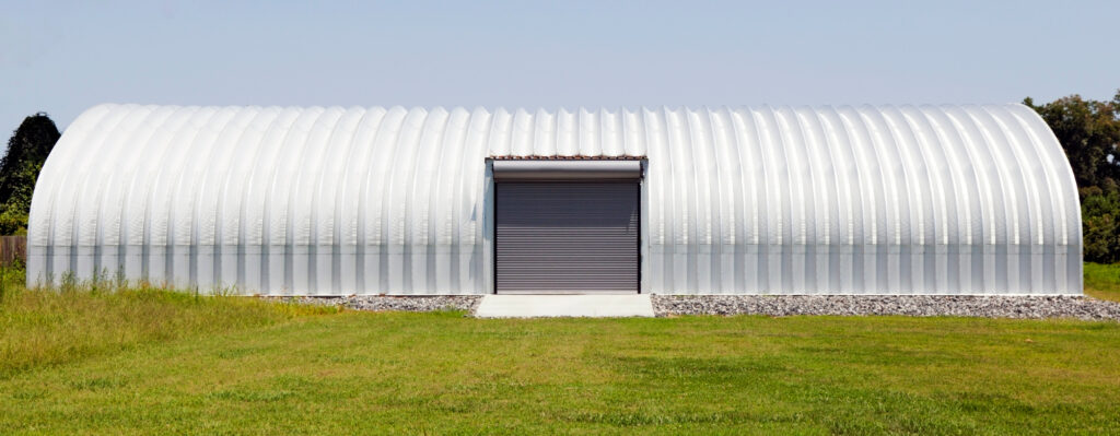 a quonset style tractor shed