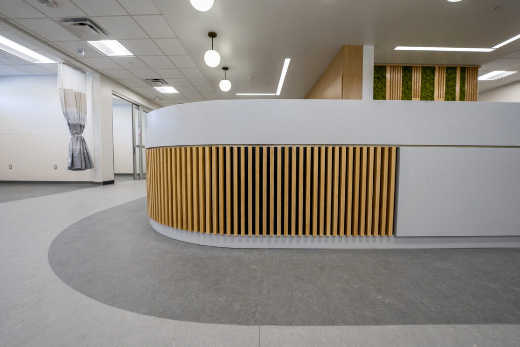 Eye Clinic Construction in Minnesota Modern reception area with wooden accents